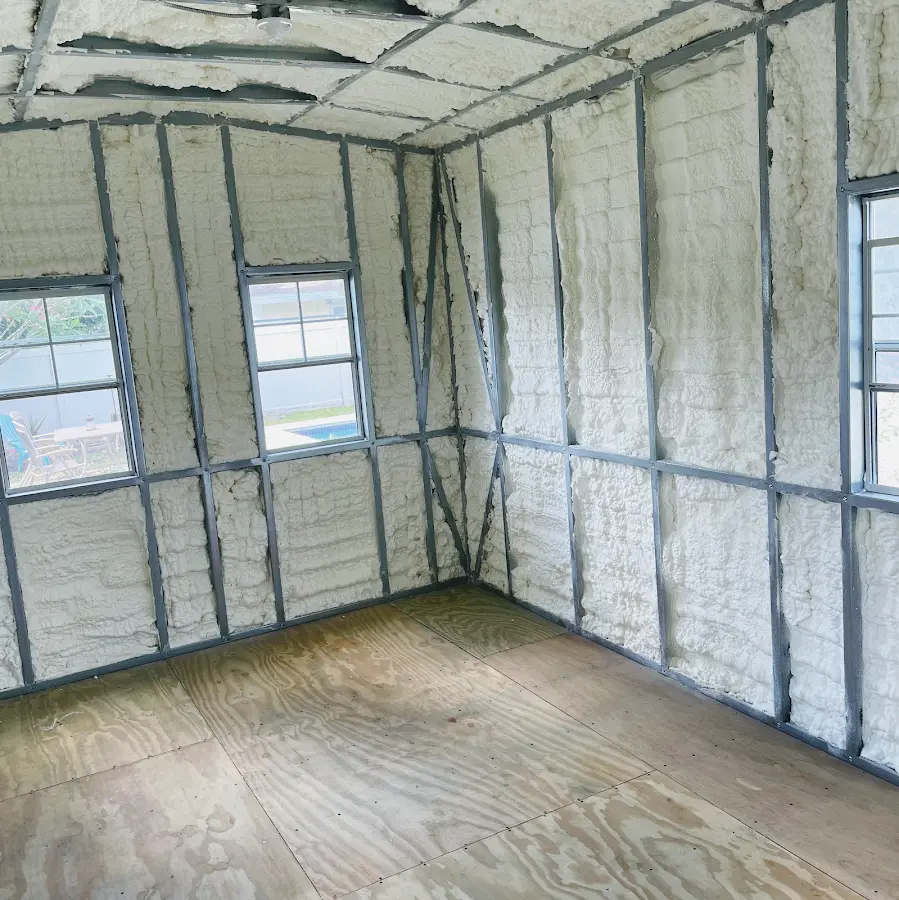 Closed-cell spray foam insulation applied to wall cavities in a residential project in West Haven